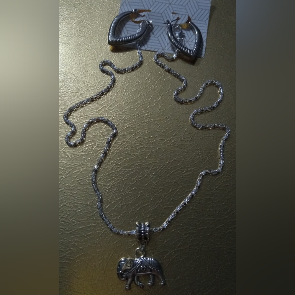Silver Sparkle Elephant Necklace & Earrings Set with Polished Finish .